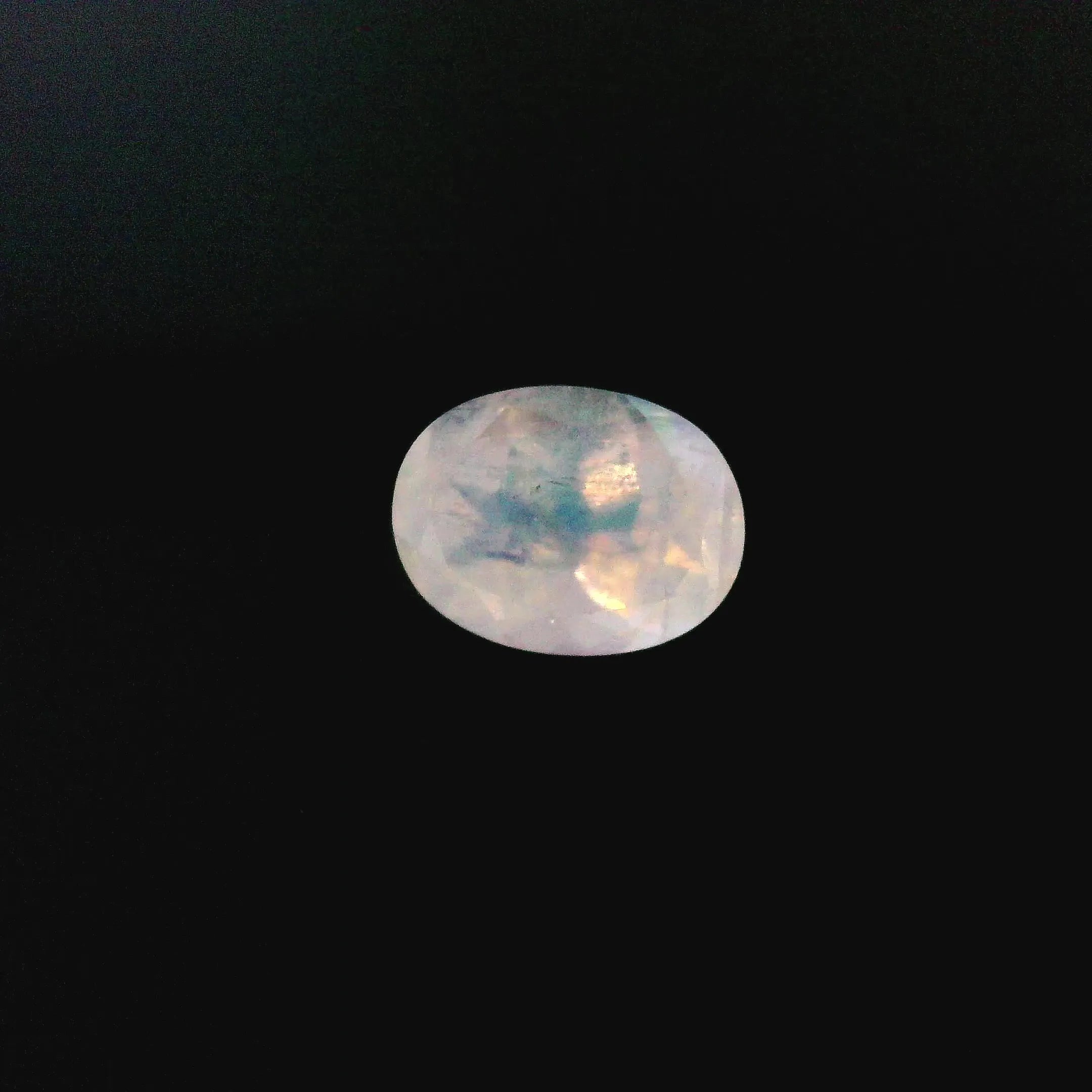1.29ct Oval Natural Moonstone (Colour White, Clarity Moderately Included, Cut Faceted)
