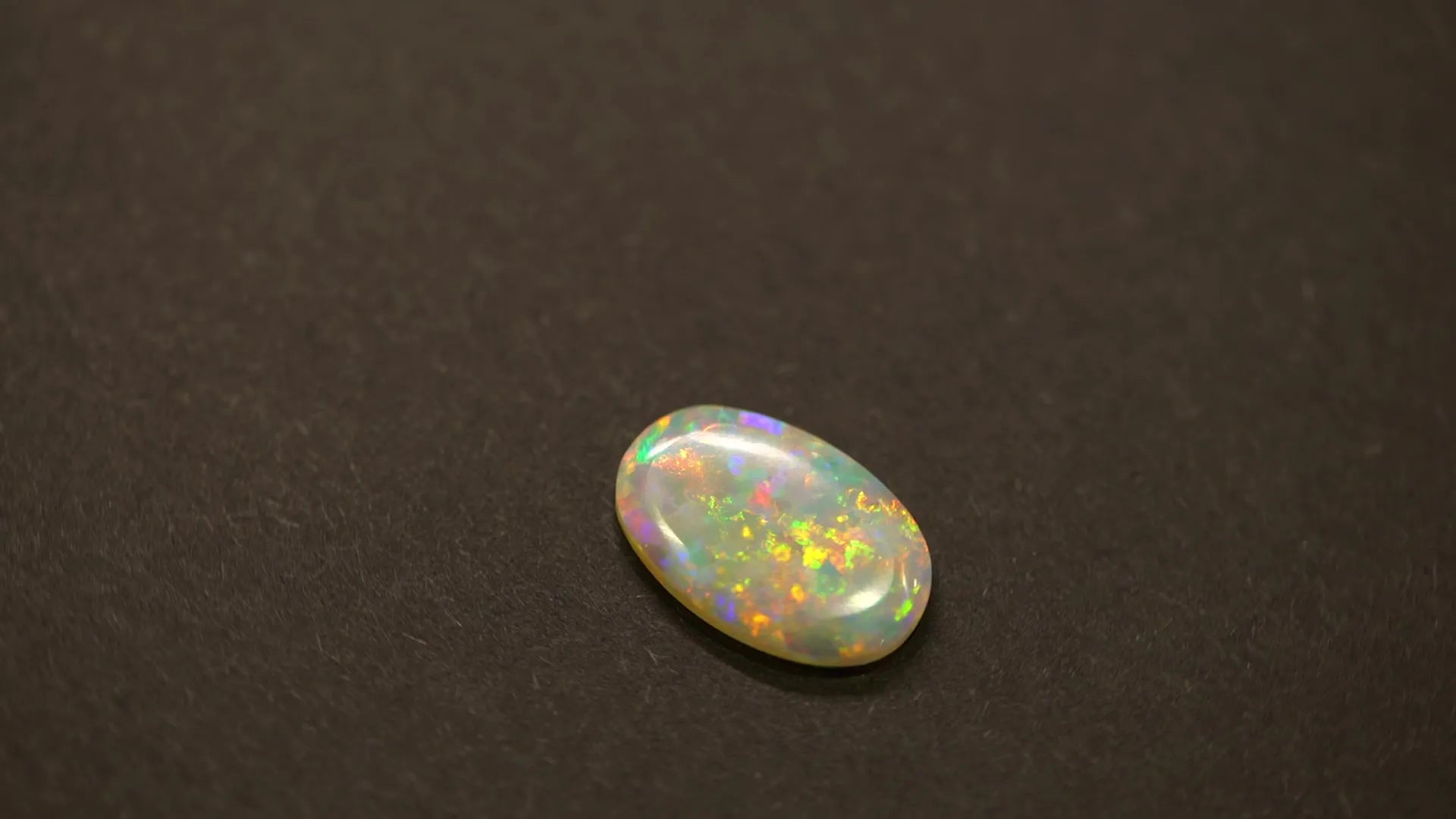 3.21ct Oval Natural Opal (Colour Multicolor, Clarity Visibly Included, Cut Cabochon)