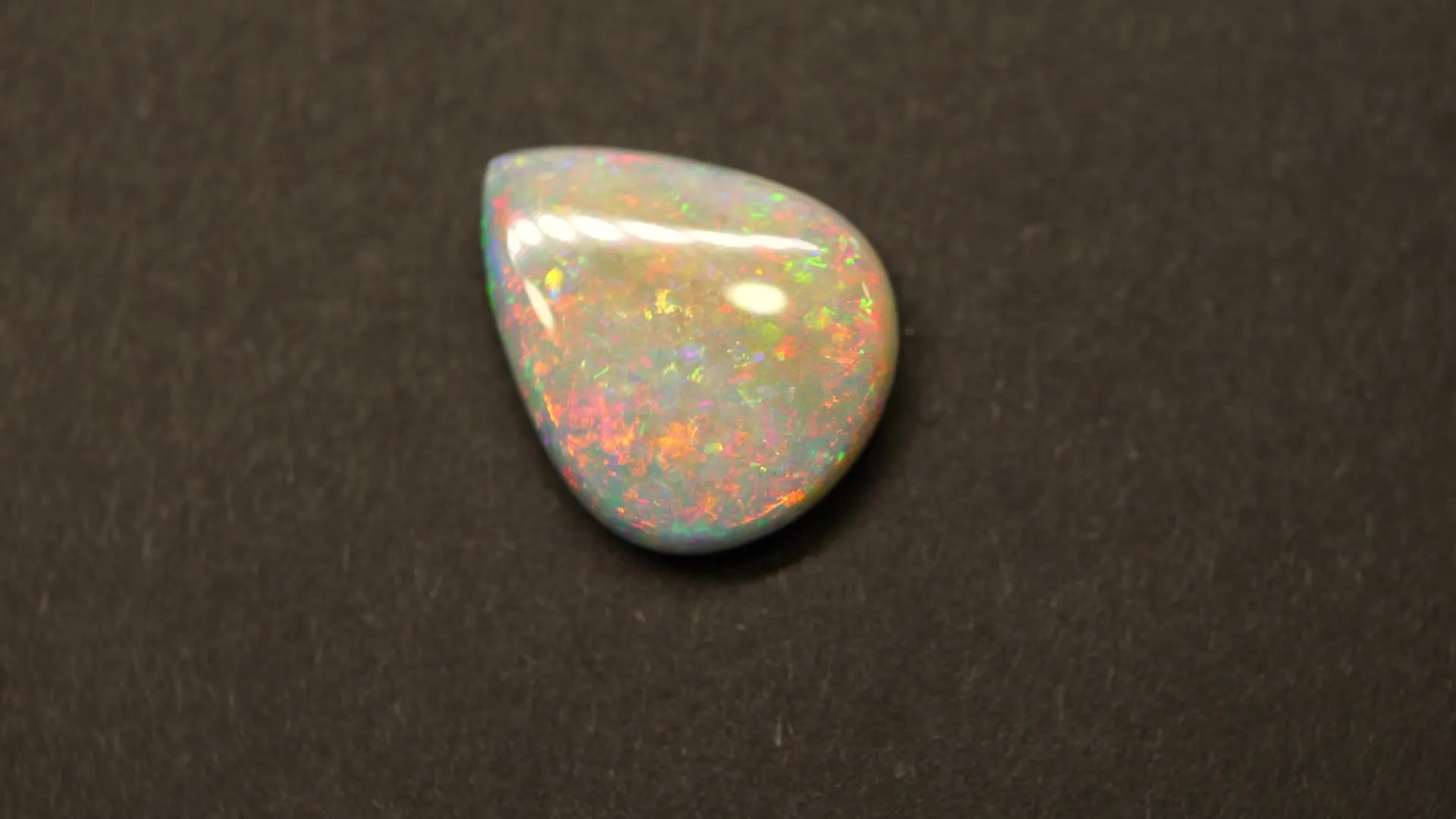 4.86ct Pear Natural Opal (Colour Multicolor, Clarity Visibly Included, Cut Cabochon)