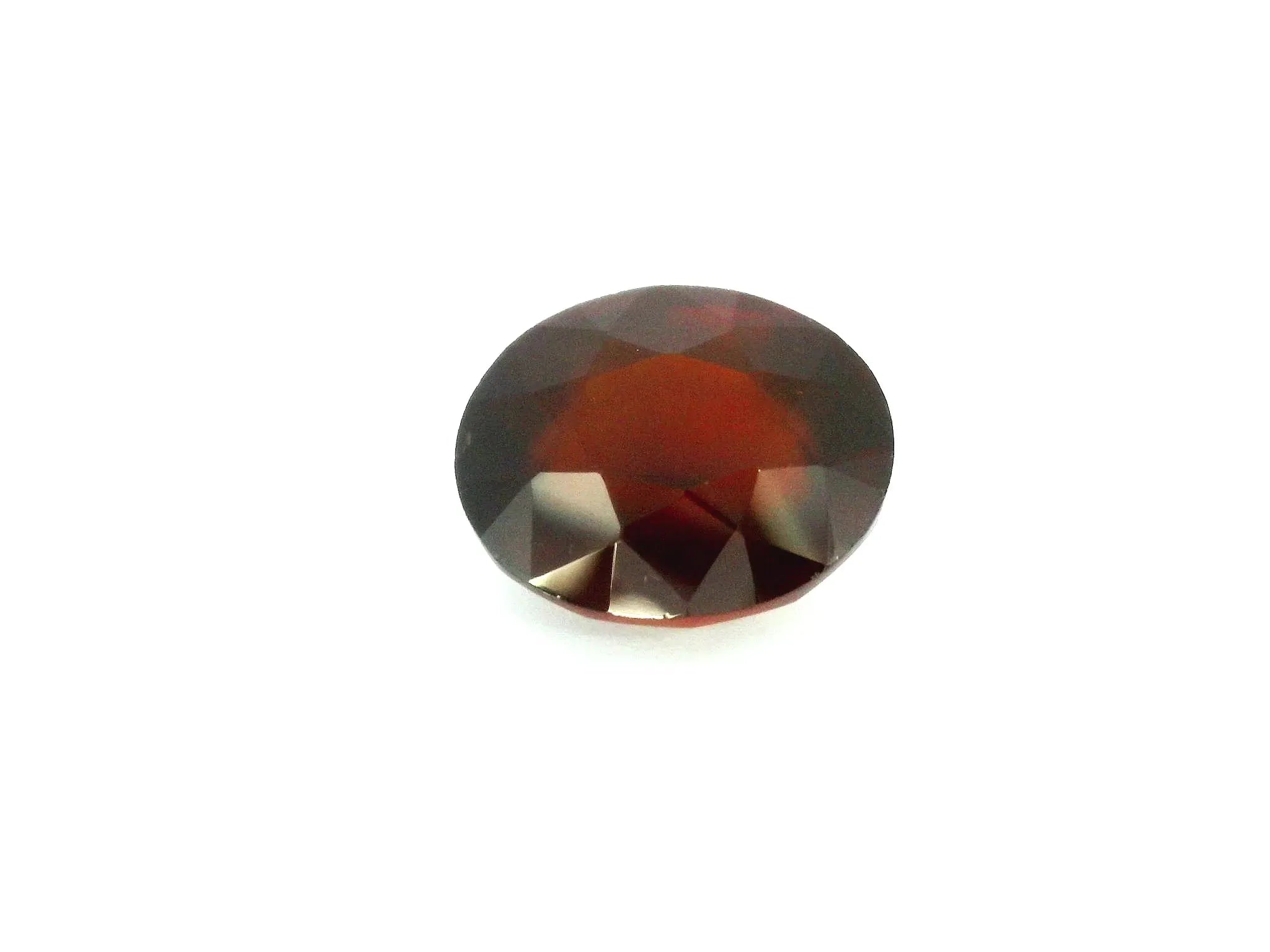 6.54ct Oval Natural Garnet (Colour Orange, Clarity Slightly Included, Cut Faceted)